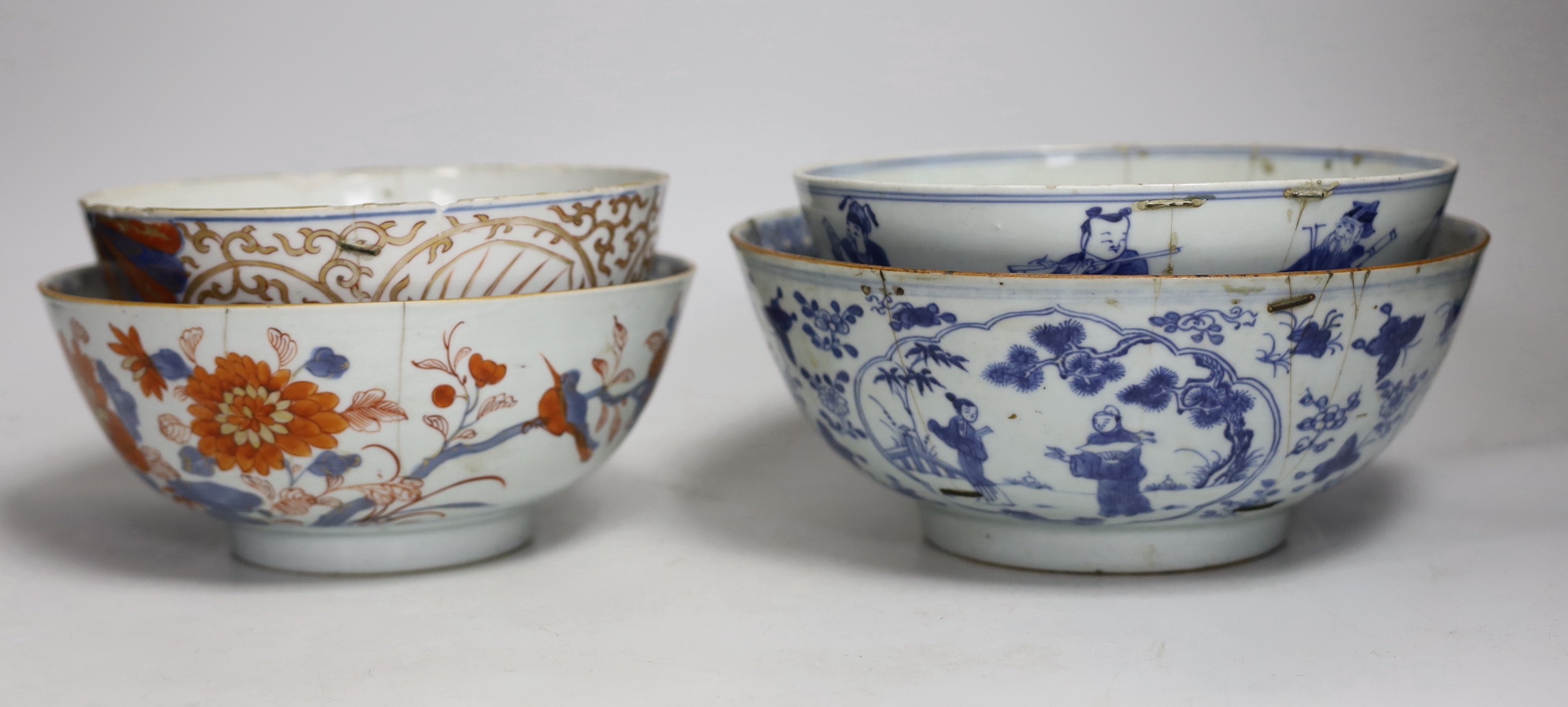 Four 18th century Chinese bowls, one painted in underglaze blue with the eight immortals, with six character Qianlong seal mark and of the period, largest 24cm diameter